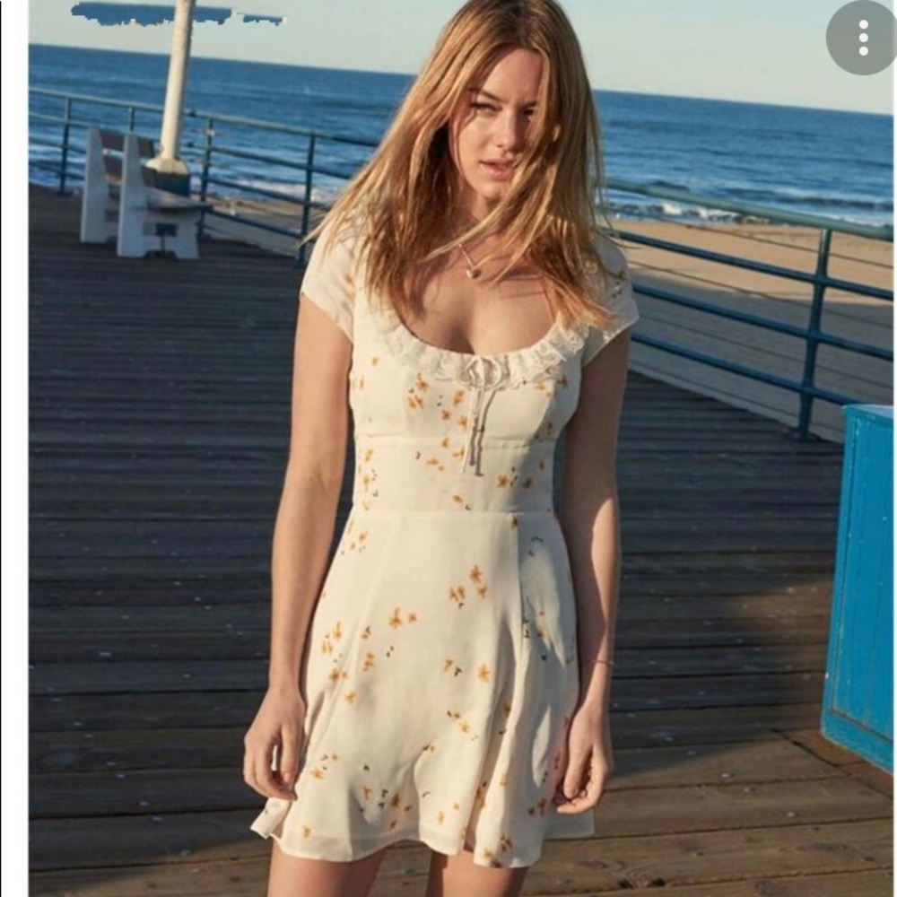 Reformation mini dress in white and yellow floral